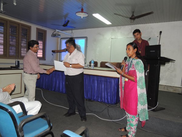 Distribution of participation certificates to the workshop participants~